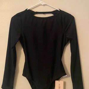 Long sleeved body suit
